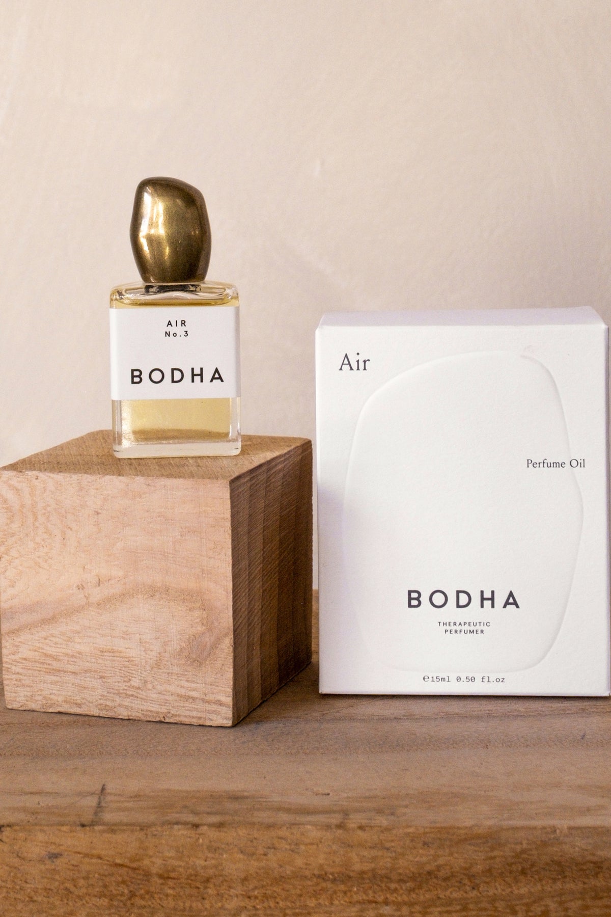 Bodha Air perfume oil with box on a wood block