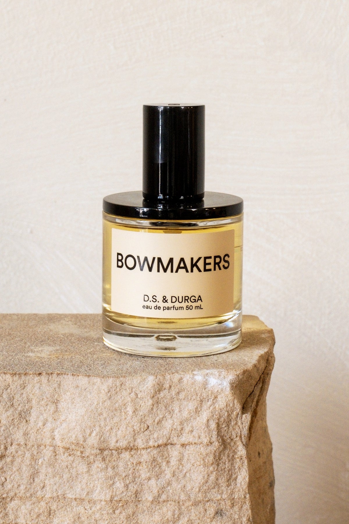 D.S. & Durga Bowmakers perfume on stone