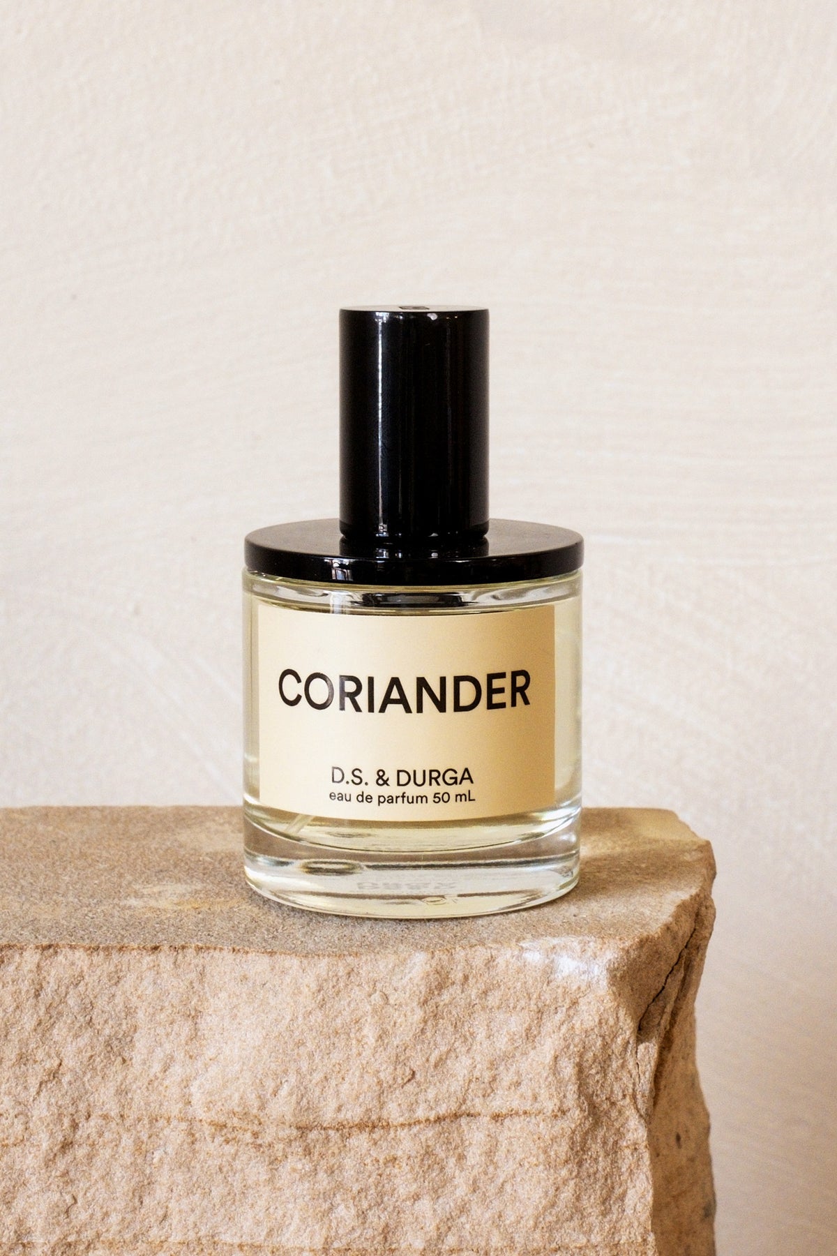 D.S. & Durga Coriander perfume on stone