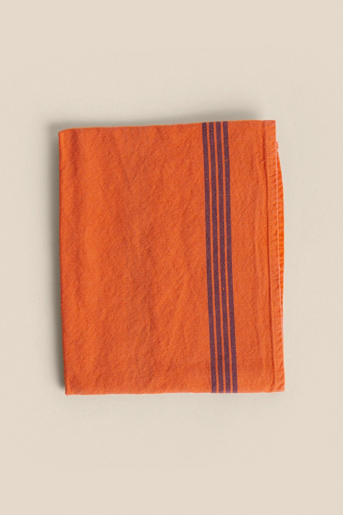 Maison Masarin neon orange linen tea towel with blue stripes