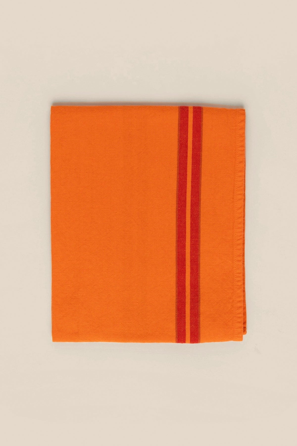 Maison Masarin neon orange linen tea towel with pink and red stripes