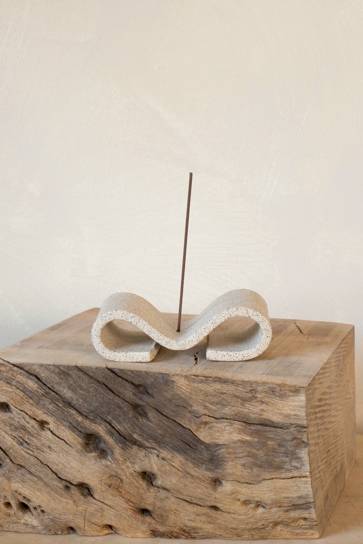 Sin Ceramics Ming incense holder in sand with incense on a wood block