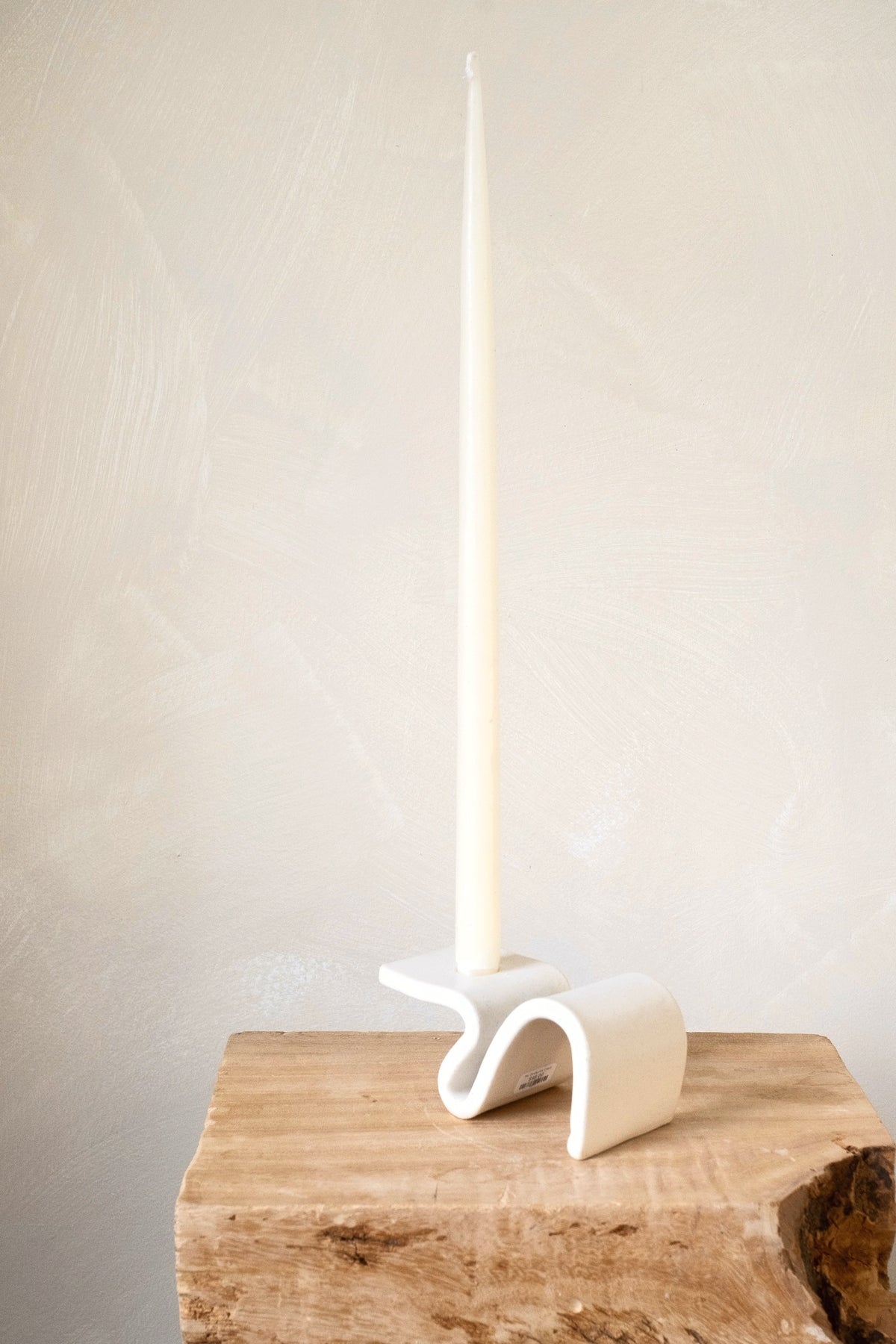 Sin Ceramics Wei candlestick in cream, angled view